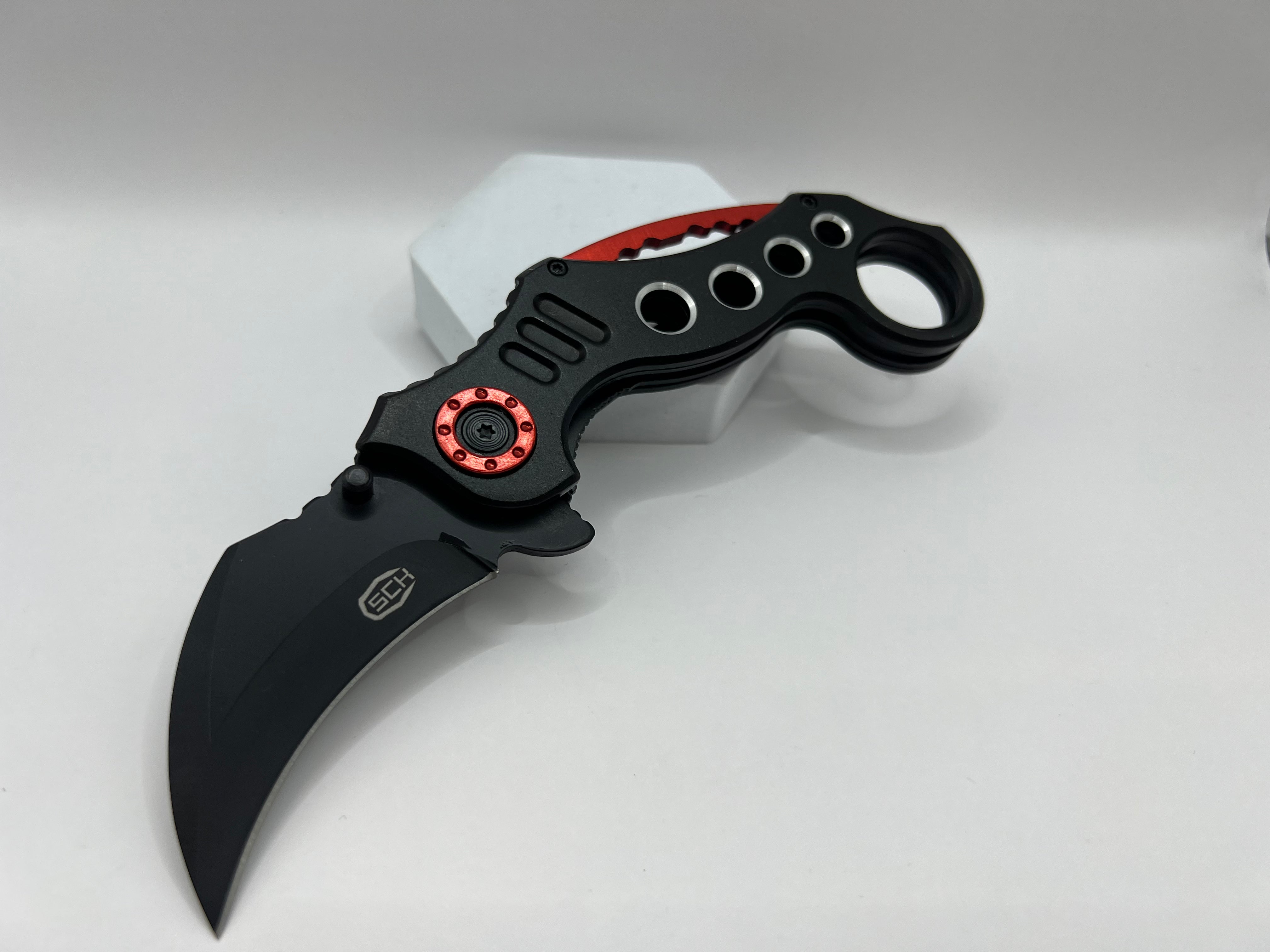 Folding carambit pocket knife-spring supported (CW-K29)