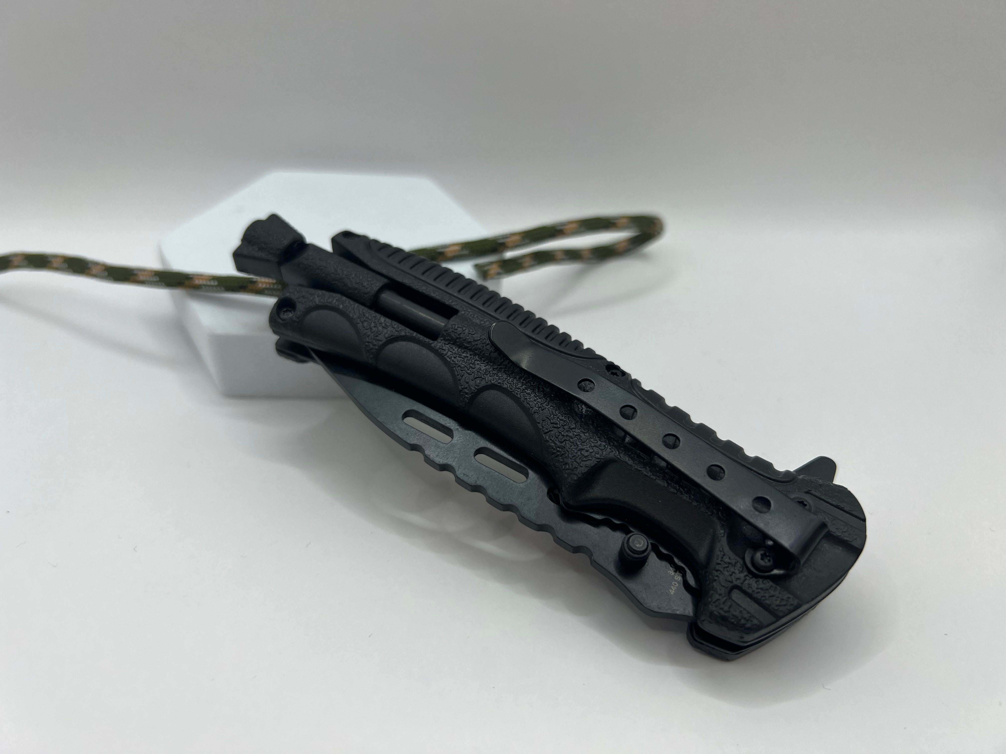 Tactical camo one-hand knife with fire starter and clip