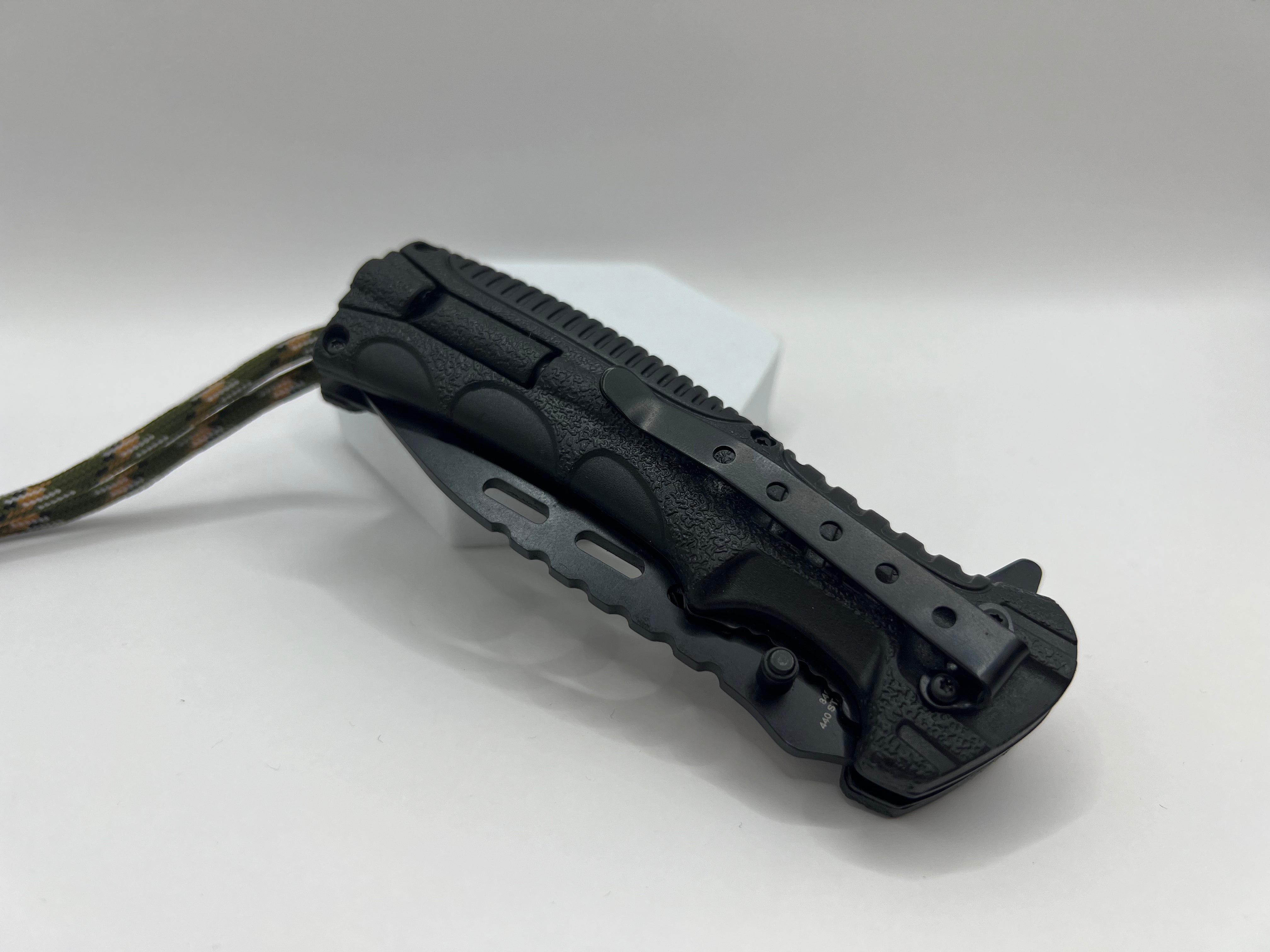 Tactical camo one-hand knife with fire starter and clip